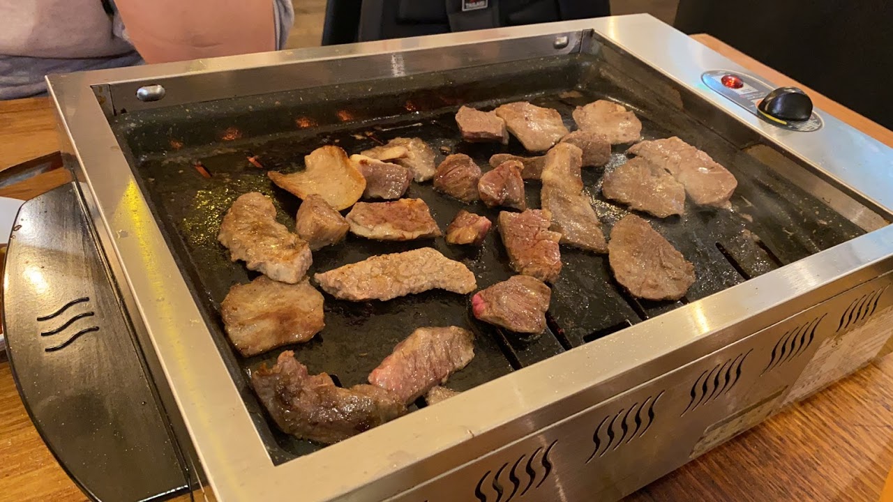 Meat grilling at a Matsusaka Backstreet table BBQ